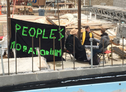 Protesters from communities of faith are locked down on construction site